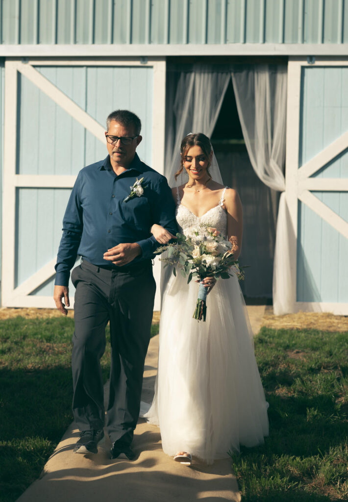 bride walking down captured by an oregon wedding photographer