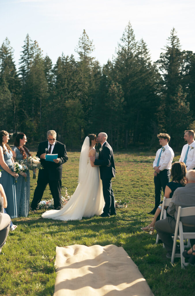 the first kiss documented by an oregon wedding photographer