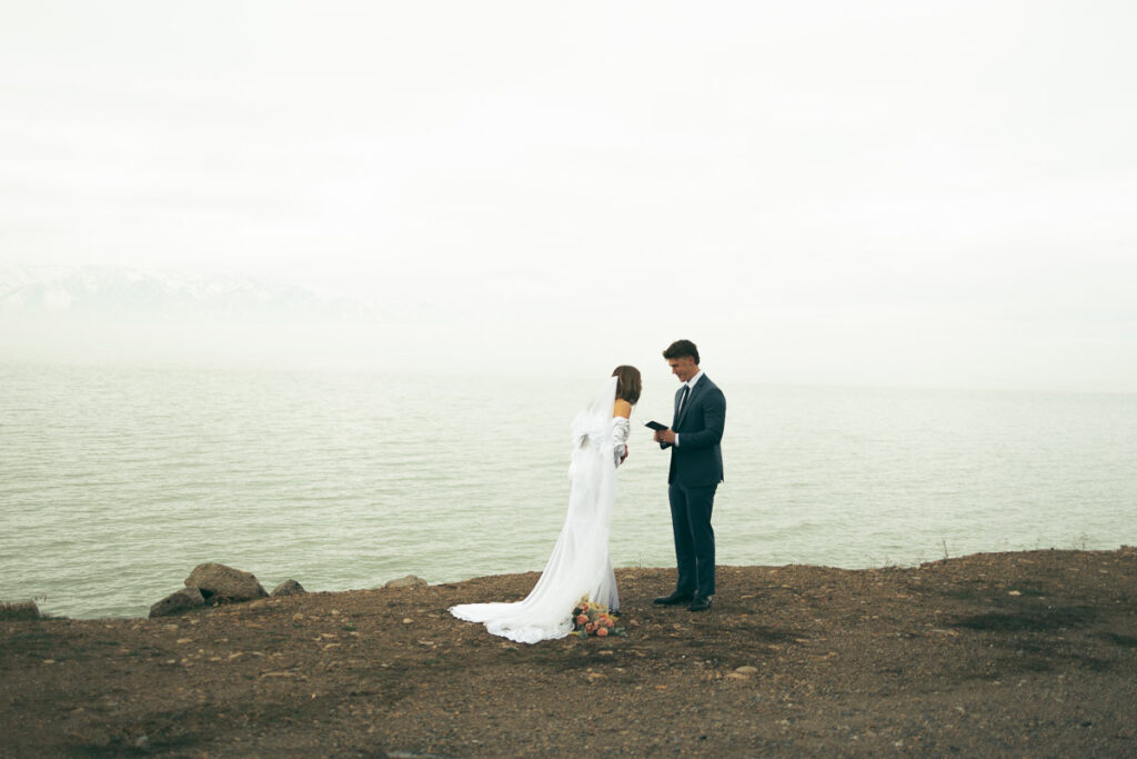 bride and groom sharing a laugh over their private vows