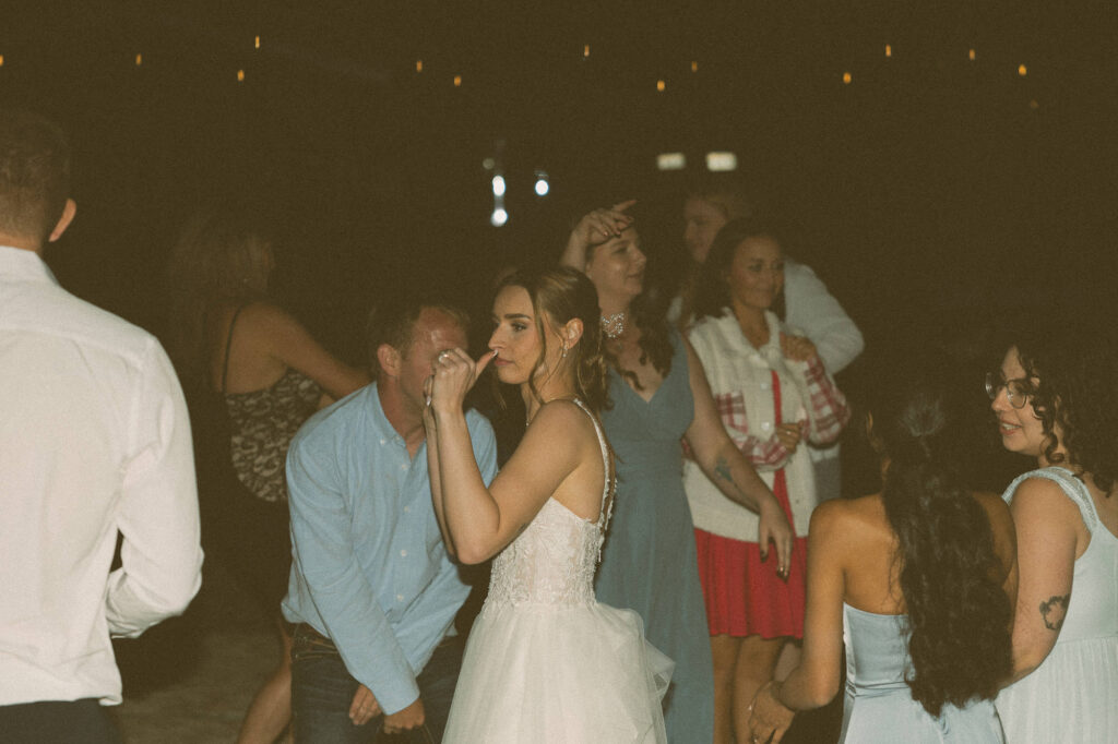 bride dancing in her oregon wedding photograph 