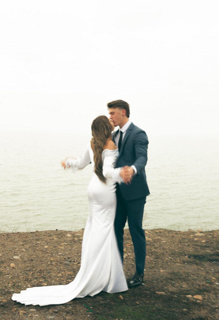 fun motion blur of bride and groom dancing