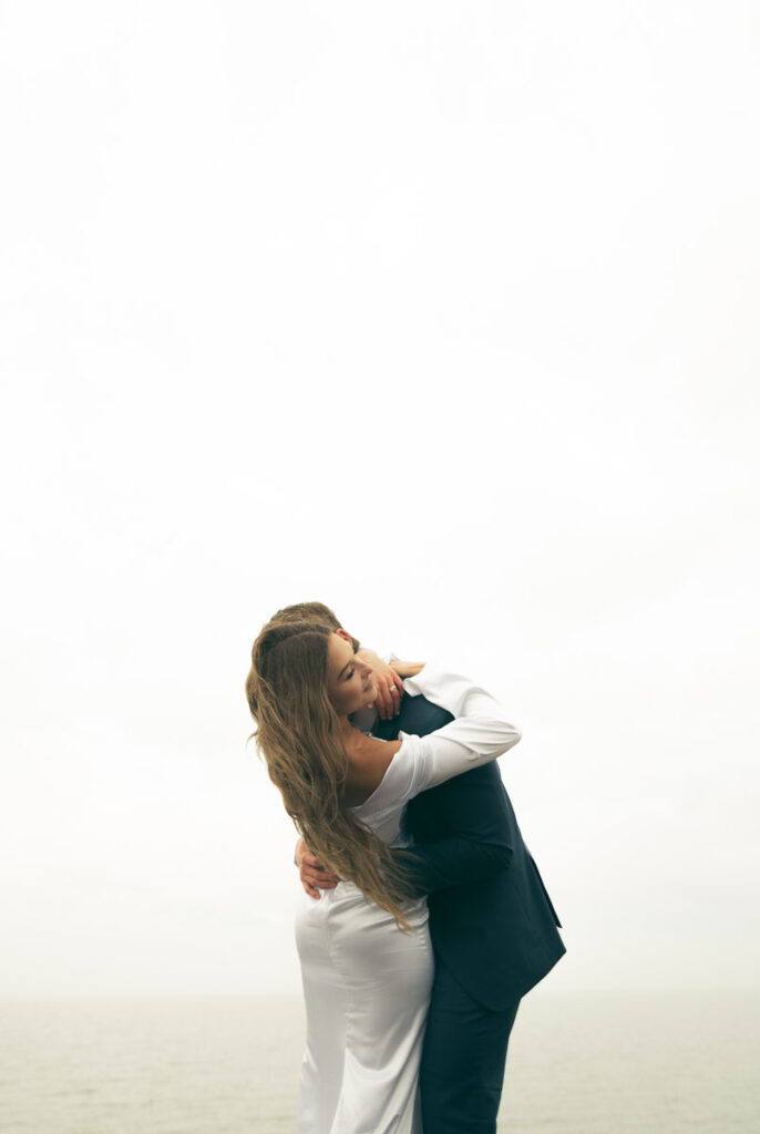 bride and groom sharing a hug to soak up all the wedding day feels