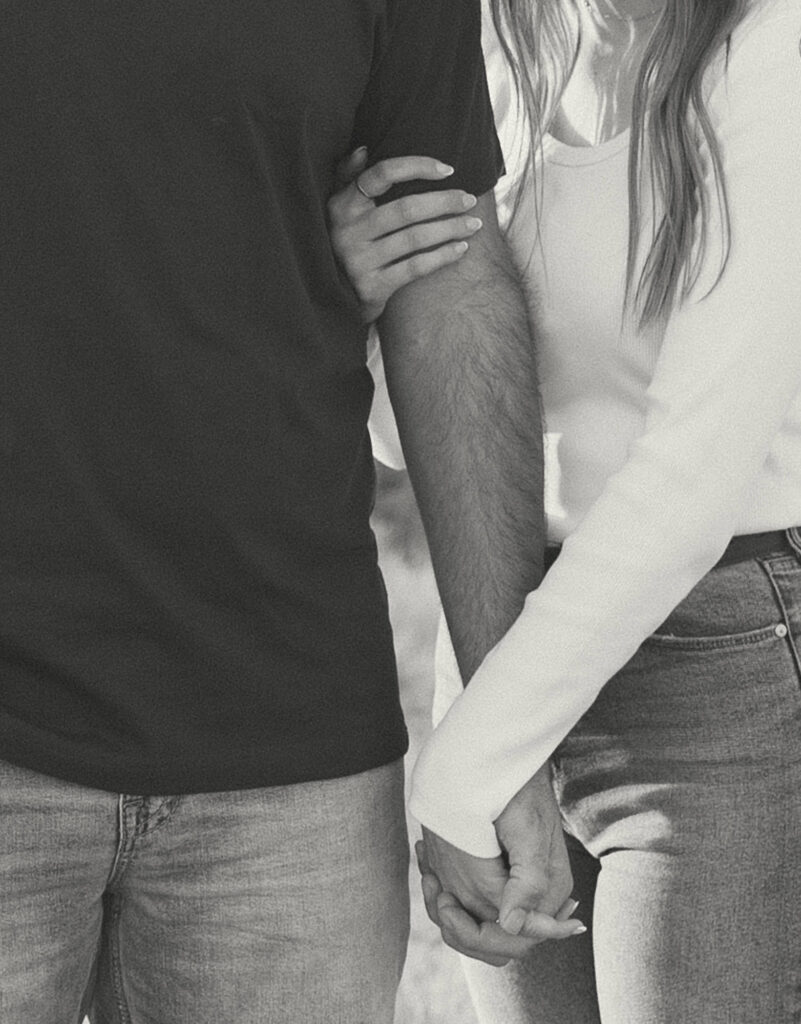 detail photo of couple's hands