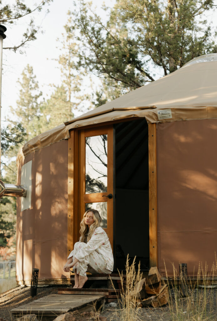 elegant getting ready photos of bride outside of yurt