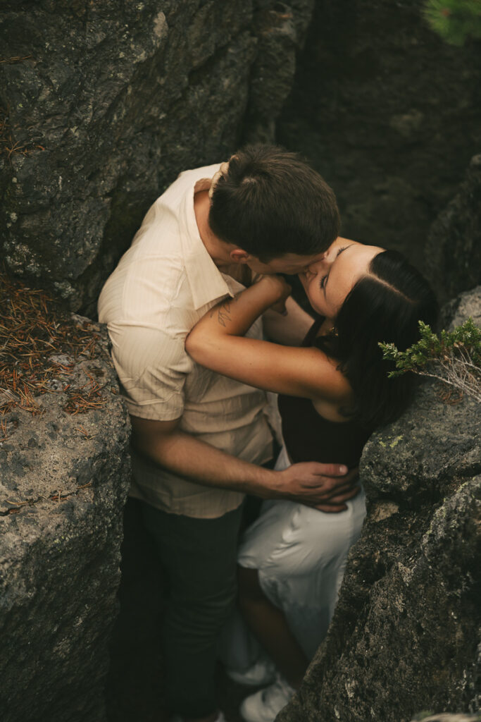 an intimate moment between woman and man sharing a kiss