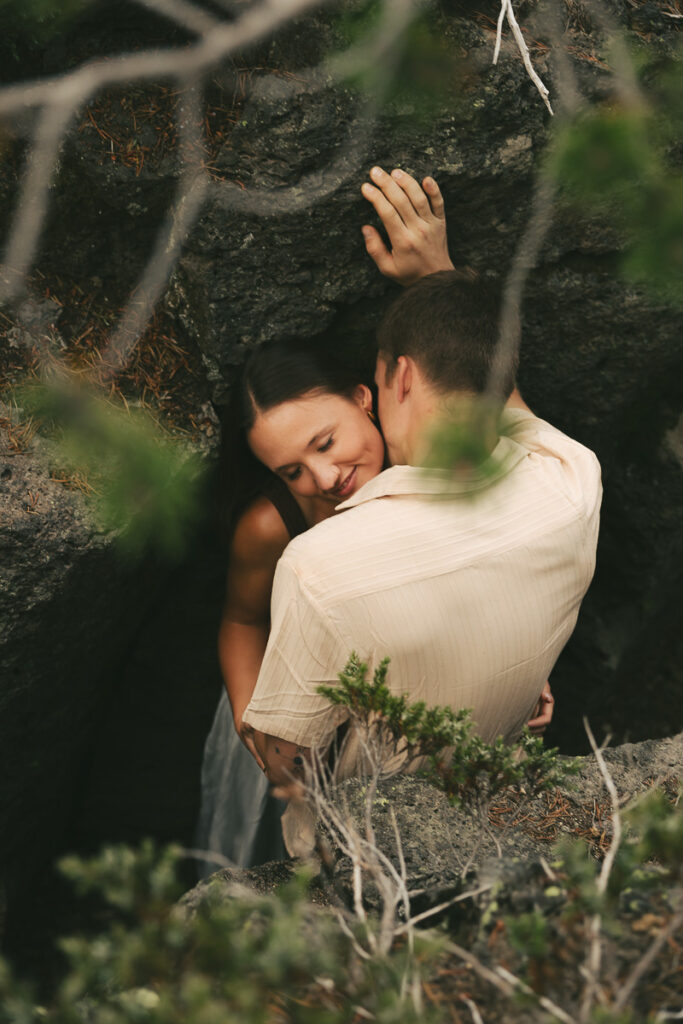 couple between rocks