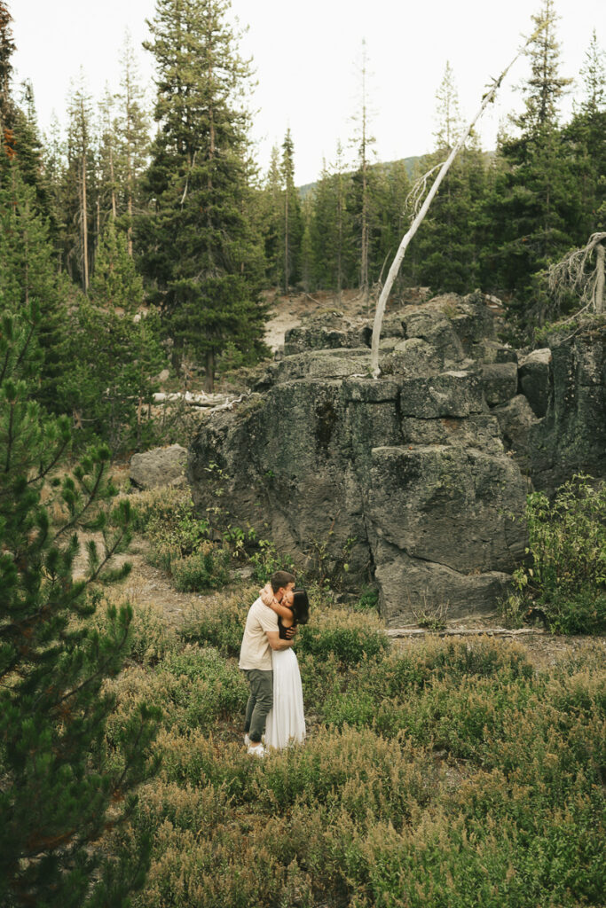 couple dancing in wildflower field