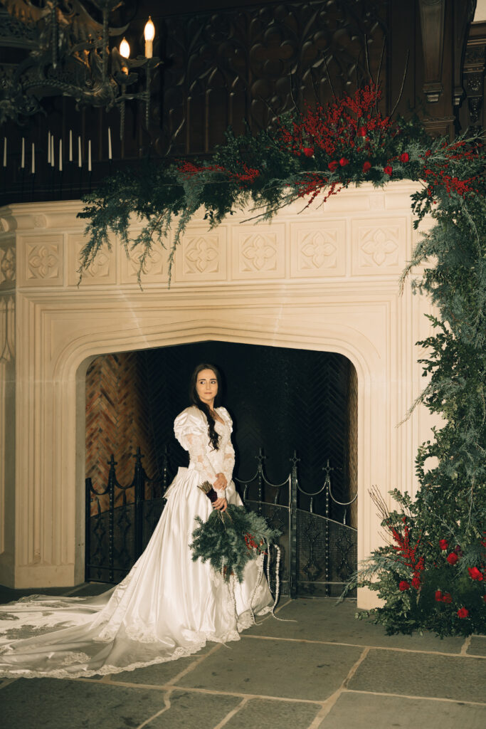 bride standing in front of mantle 