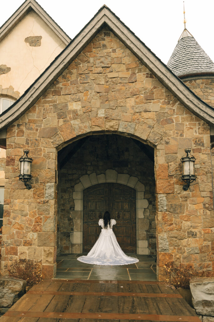 bride about to open doors of venue