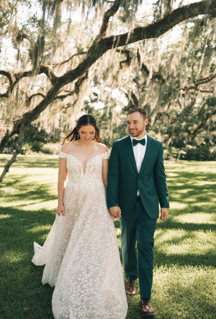 bride and groom walking towards camera