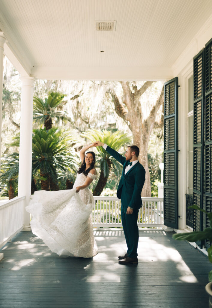 groom spinning his bride