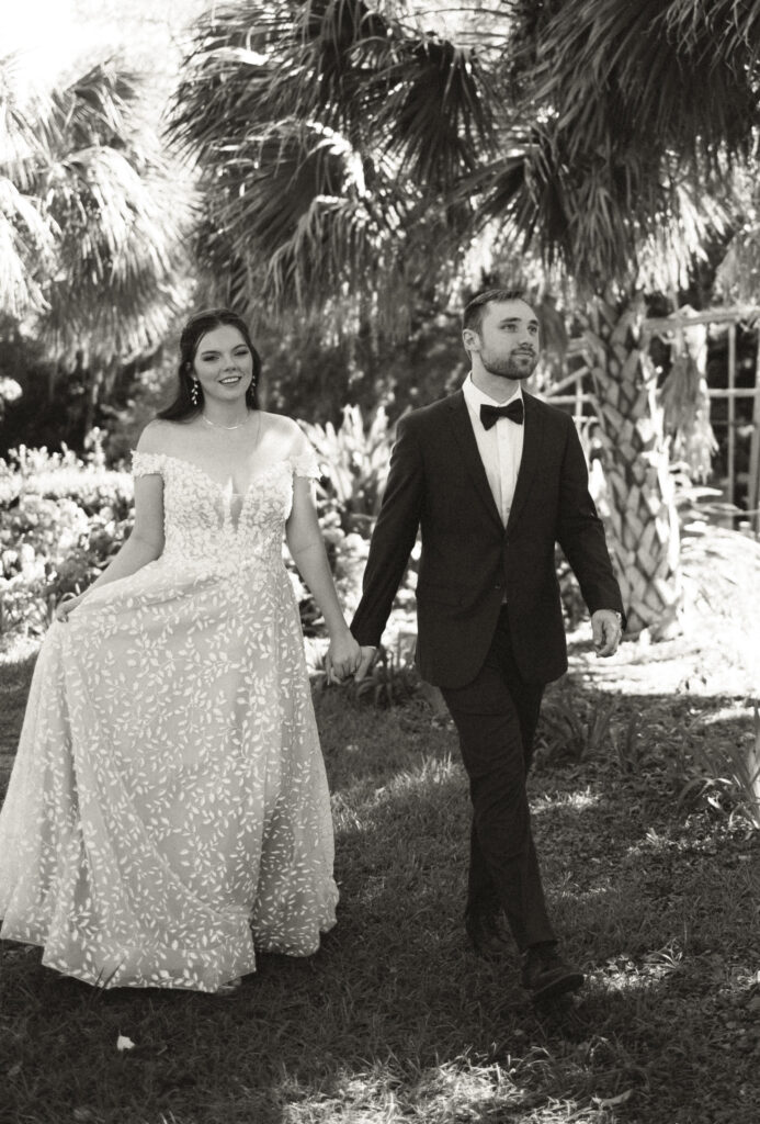 bride and groom walking to reception