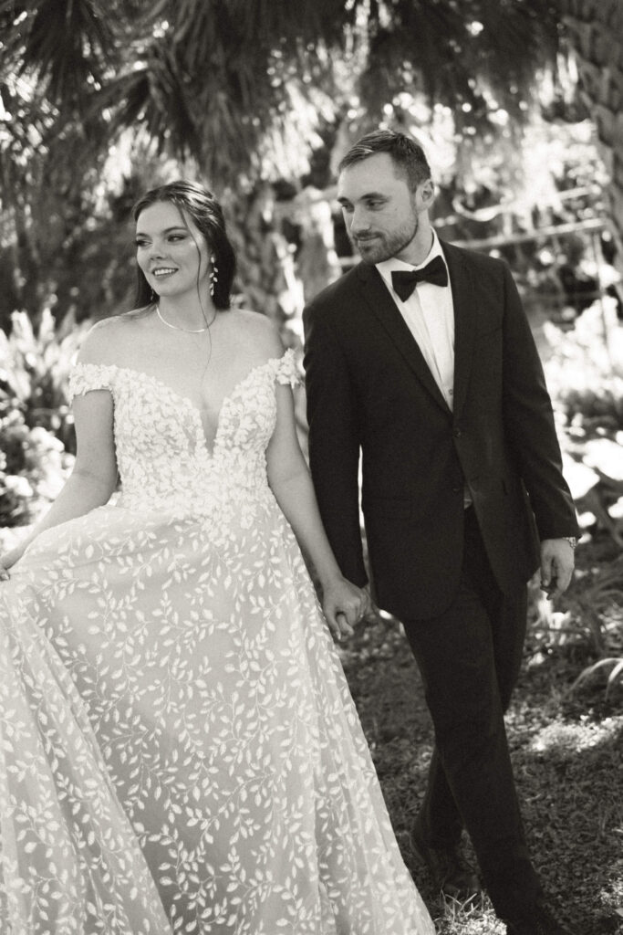 bride and groom walking to reception