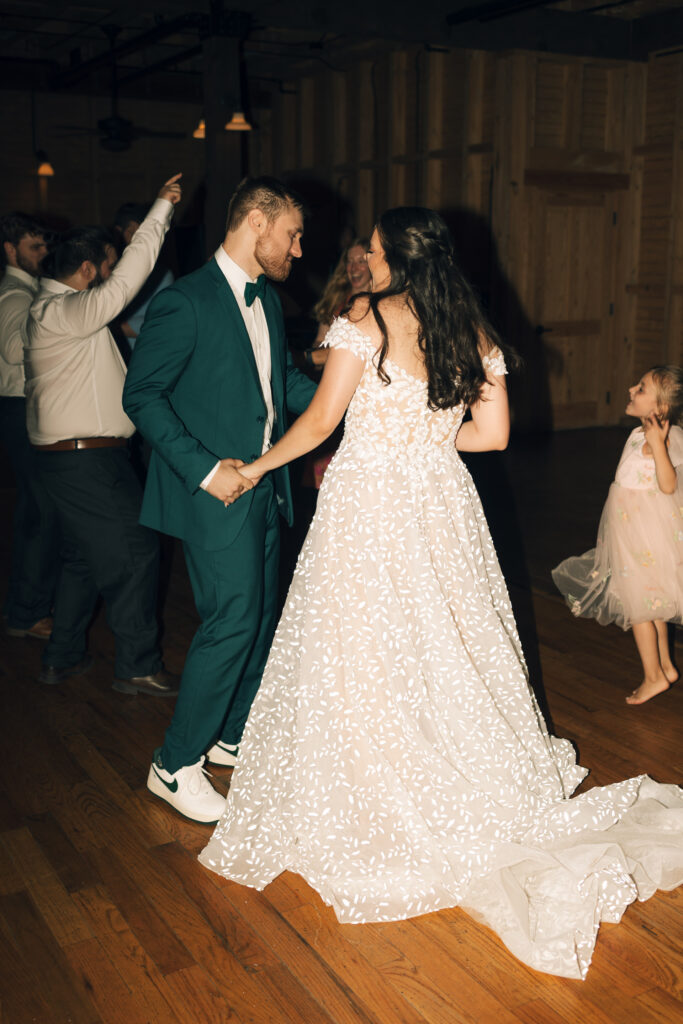 bride and groom dancing at reception