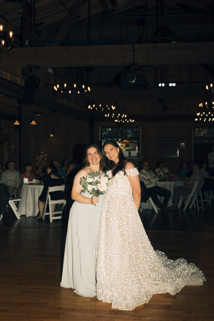 bouquet toss winner and bride