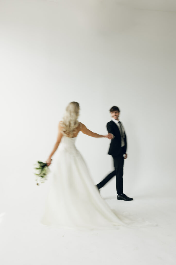 motion blur bride and groom walking in circle