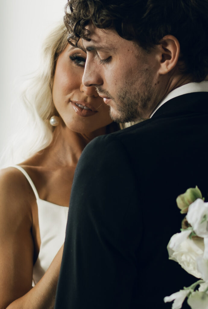 close up of bride and groom's face