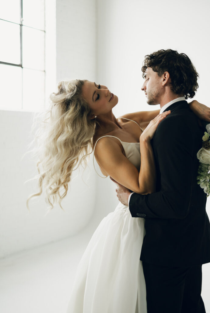 bride and groom swaying