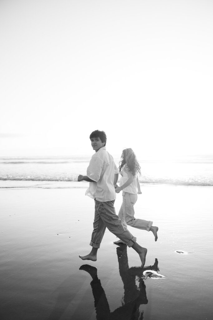 couple running at beach