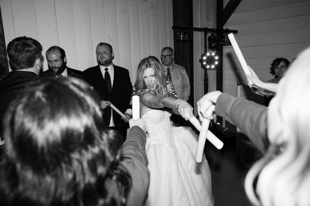 bride dancing at reception with glow sticks