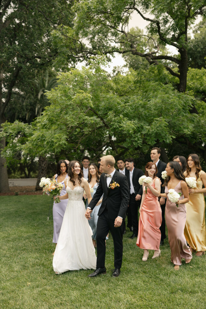 wedding party laughing together