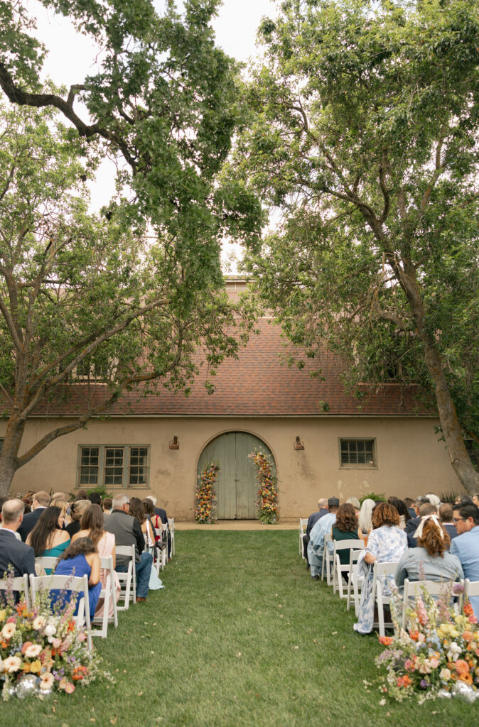 wedding guests sitting before ceremony starts