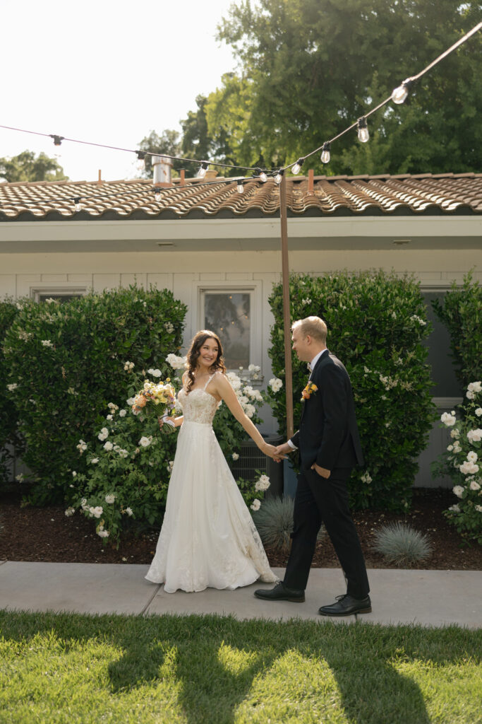 bride leading her groom away