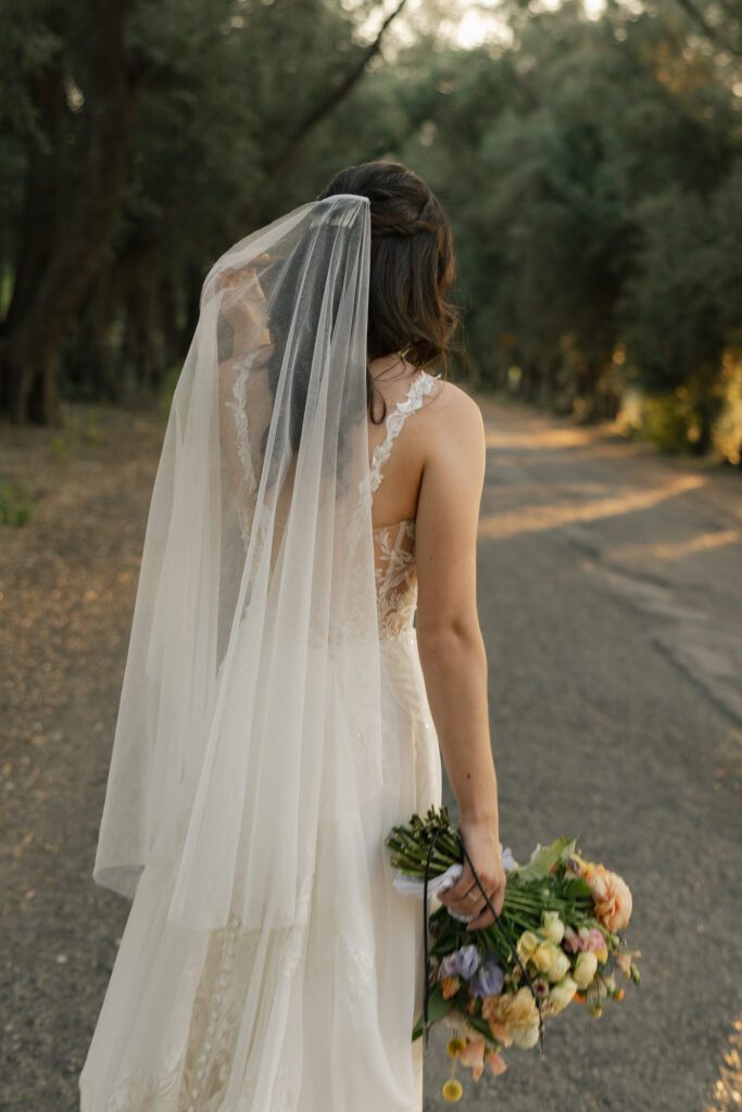 golden hour photos with bride and groom walking