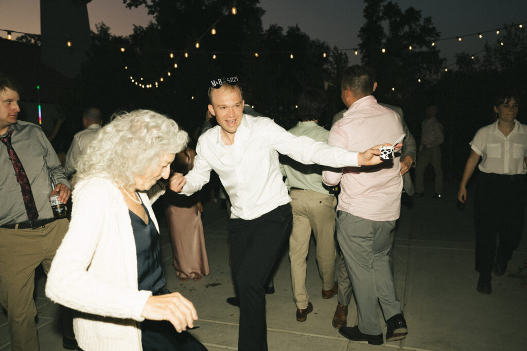 groom dances with grandma