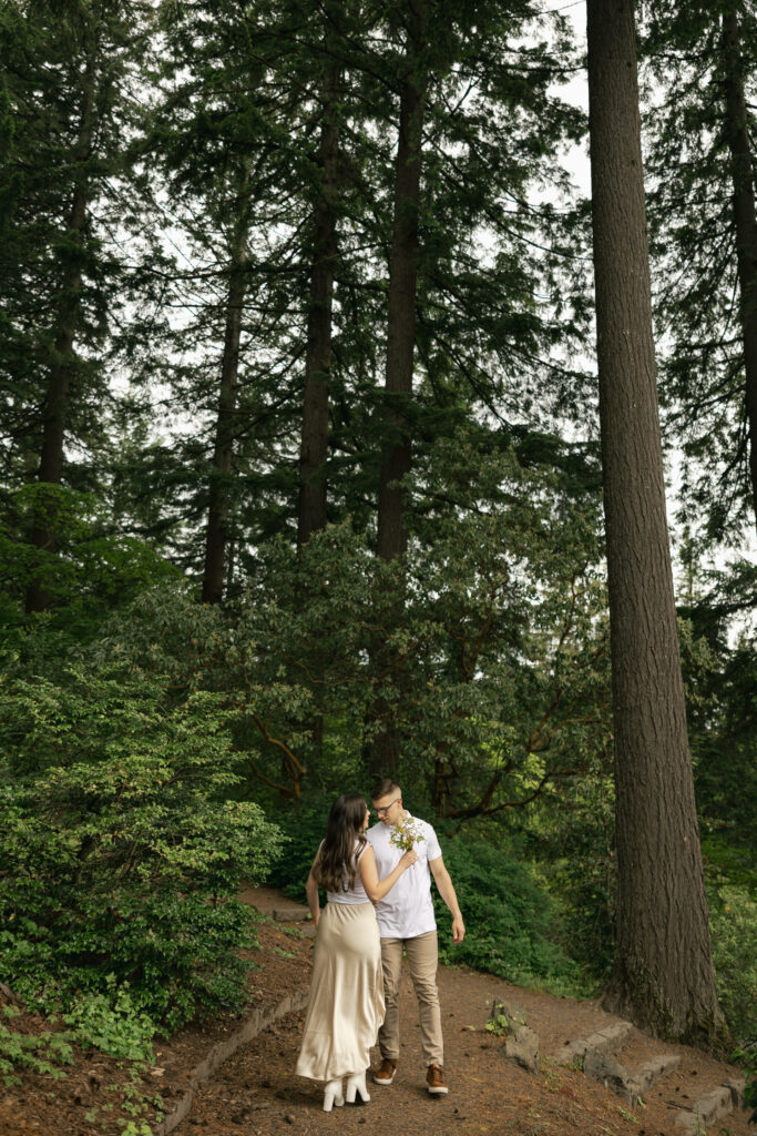 man and woman face each other on trail