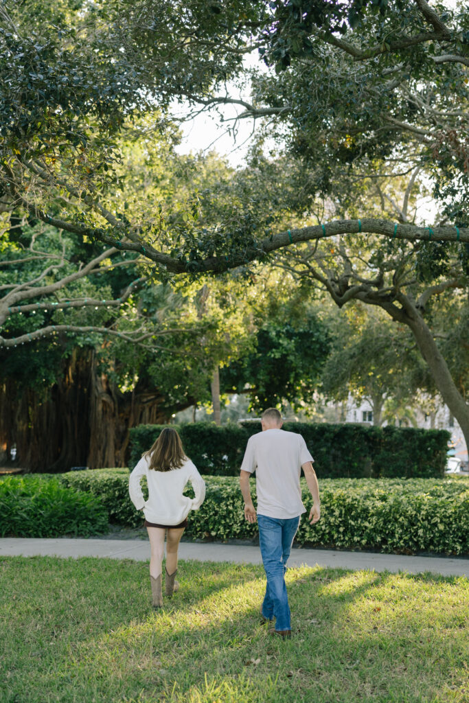 Couple walking away in North Straub park in St pete