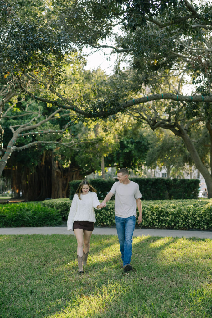 Couple walking in North Straub park in St pete