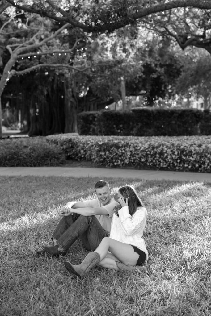 couple sitting side-by-side in park