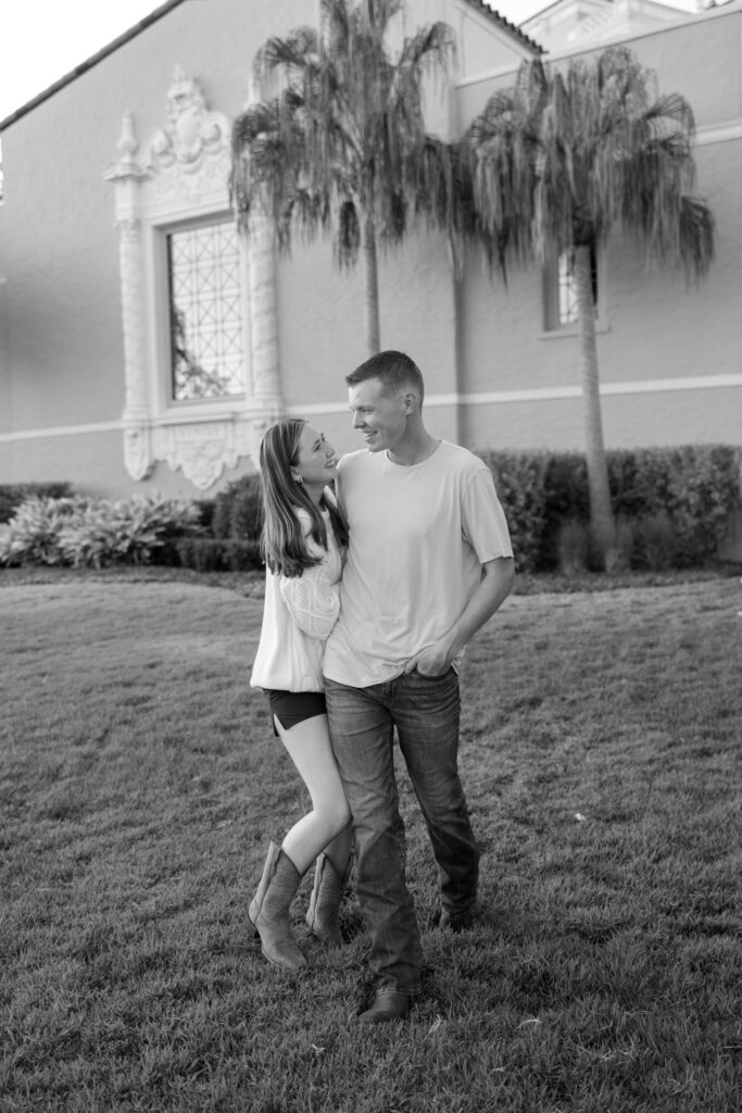 couple walking in front of vinoy st petersburg