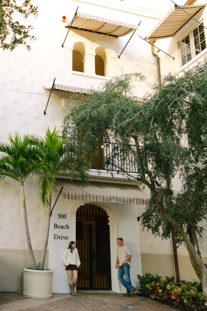 couple leaning against building in st petersburg