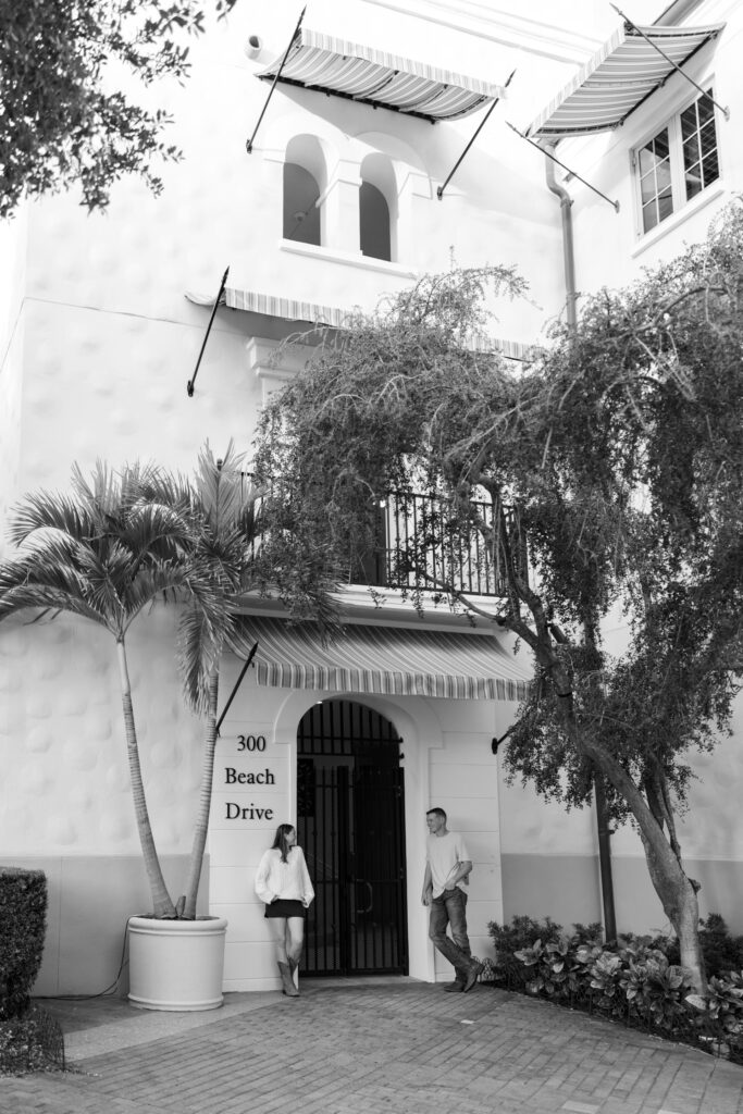 couple leaning against building in st petersburg