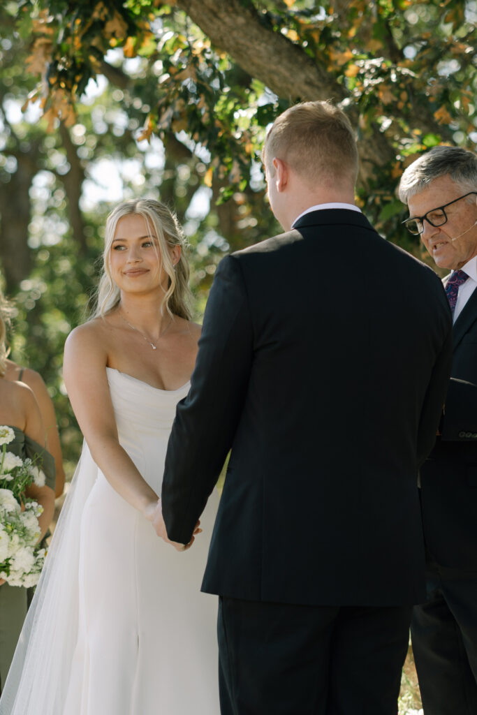 bride looking a guests during ceremony