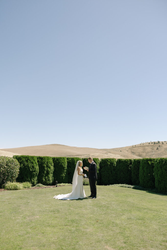 bride and groom private vows in garden