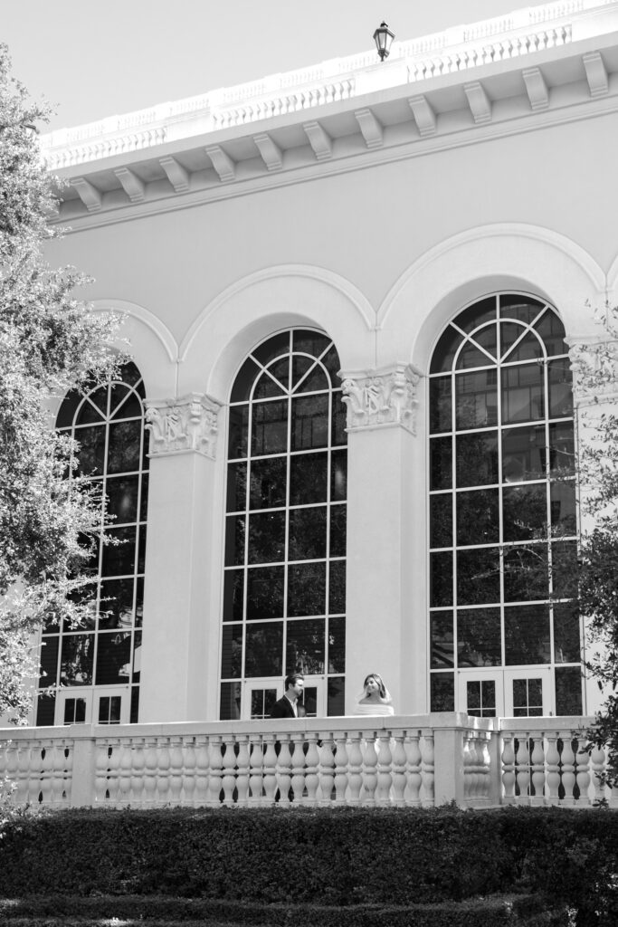couple posing on balcony
