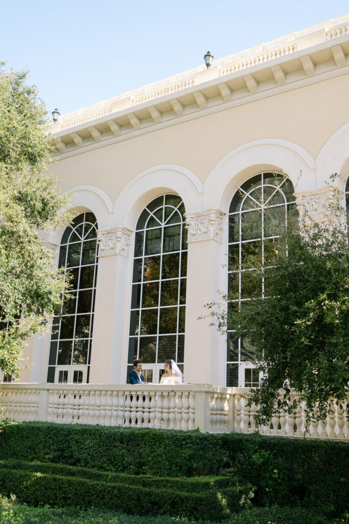 couple posing on balcony